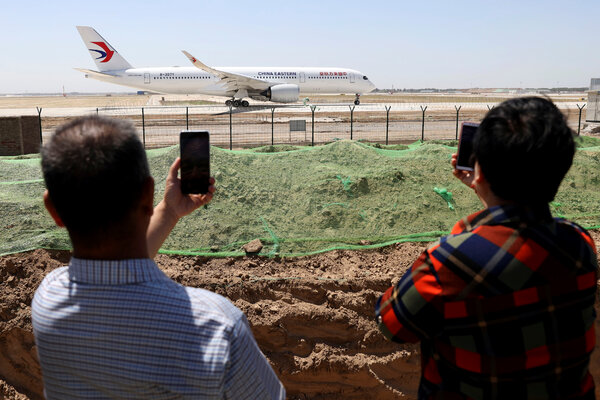 Residents in 2019 watched a China Eastern passenger jet preparing to take off on a test flight from the Beijing Daxing International Airport.