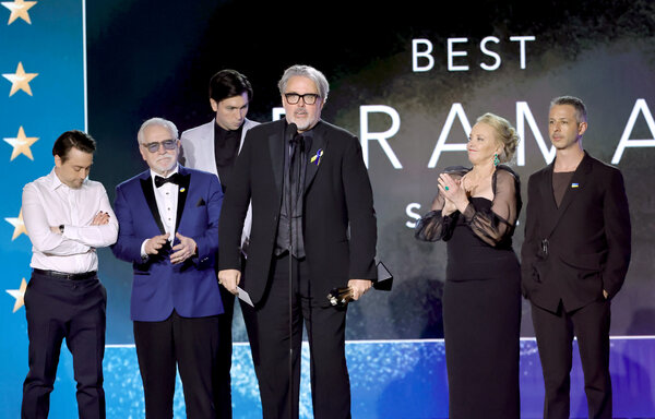 From left, Kieran Culkin, Brian Cox, Nicholas Braun, Scott Ferguson, J. Smith-Cameron and Jeremy Strong accept the award for best drama series for “Succession.”