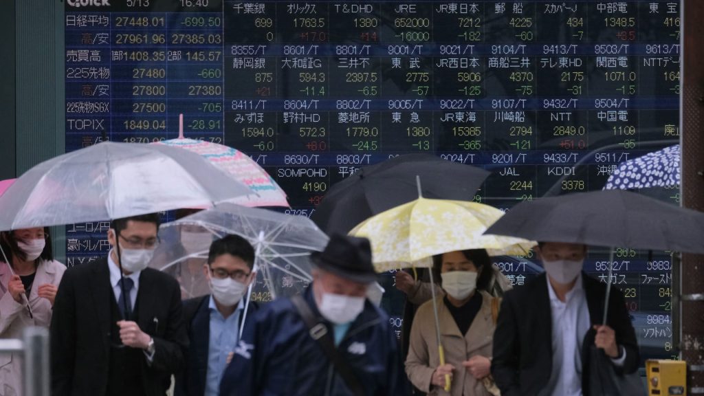 Bolsas de Hong Kong sobem mistas nos mercados asiáticos antes da decisão da taxa do Fed